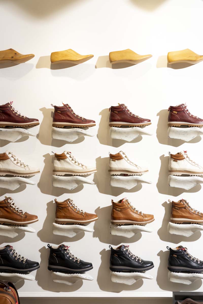 Photograph of various models of ankle boots from the Pikolinos store in Bilbao