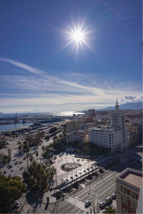 Image with a plane from above of the hotel Ac Hotel by Marriot and what is around it