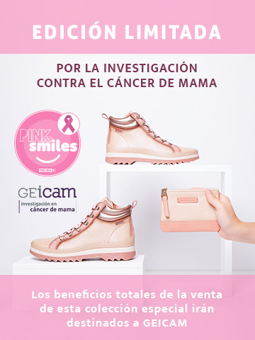 Logo rosa de Pink Smiles con GEicam. Edición limitada por la investigación contra el cáncer de mama. Los beneficios totales de la venta de esta colección especial irán destinados a GEICAM.
