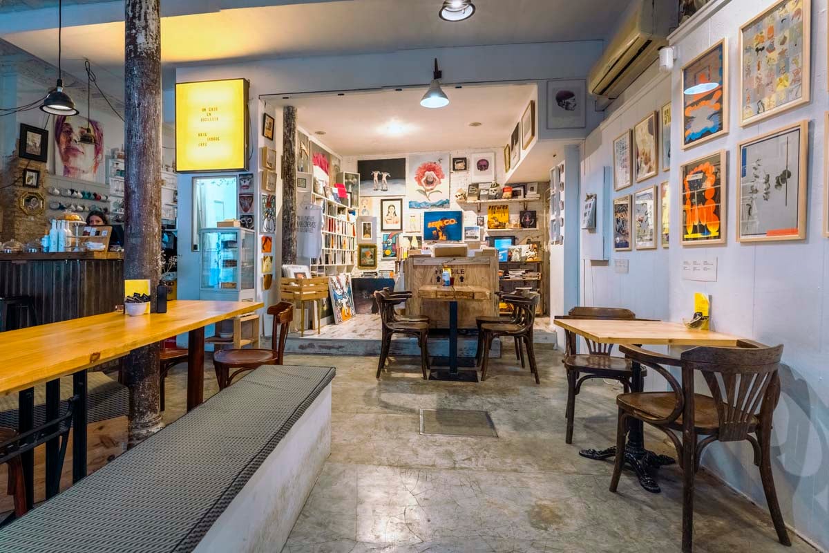 Photograph of the interior of the cafeteria A cat on a bicycle