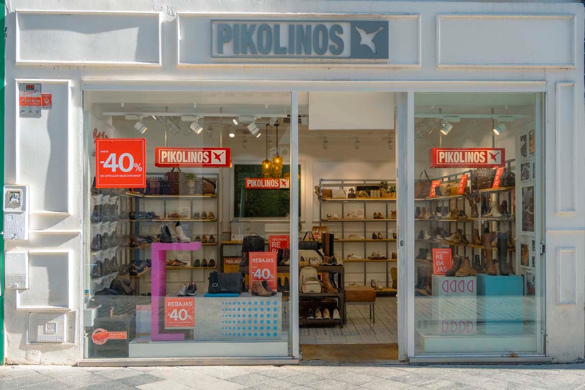 Photograph of the logo and the back of some Pikolinos sports shoes