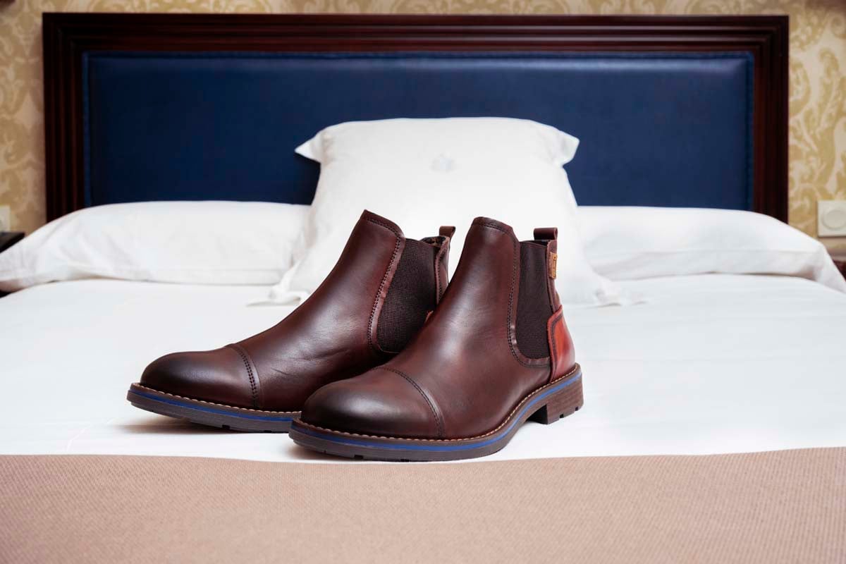 Photograph of a pair of black Pikolinos women's ankle boots at the Carlton hotel