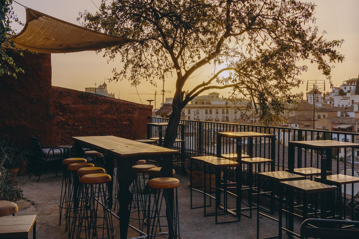 Image of the terrace and the sunset of Huerto del Loro