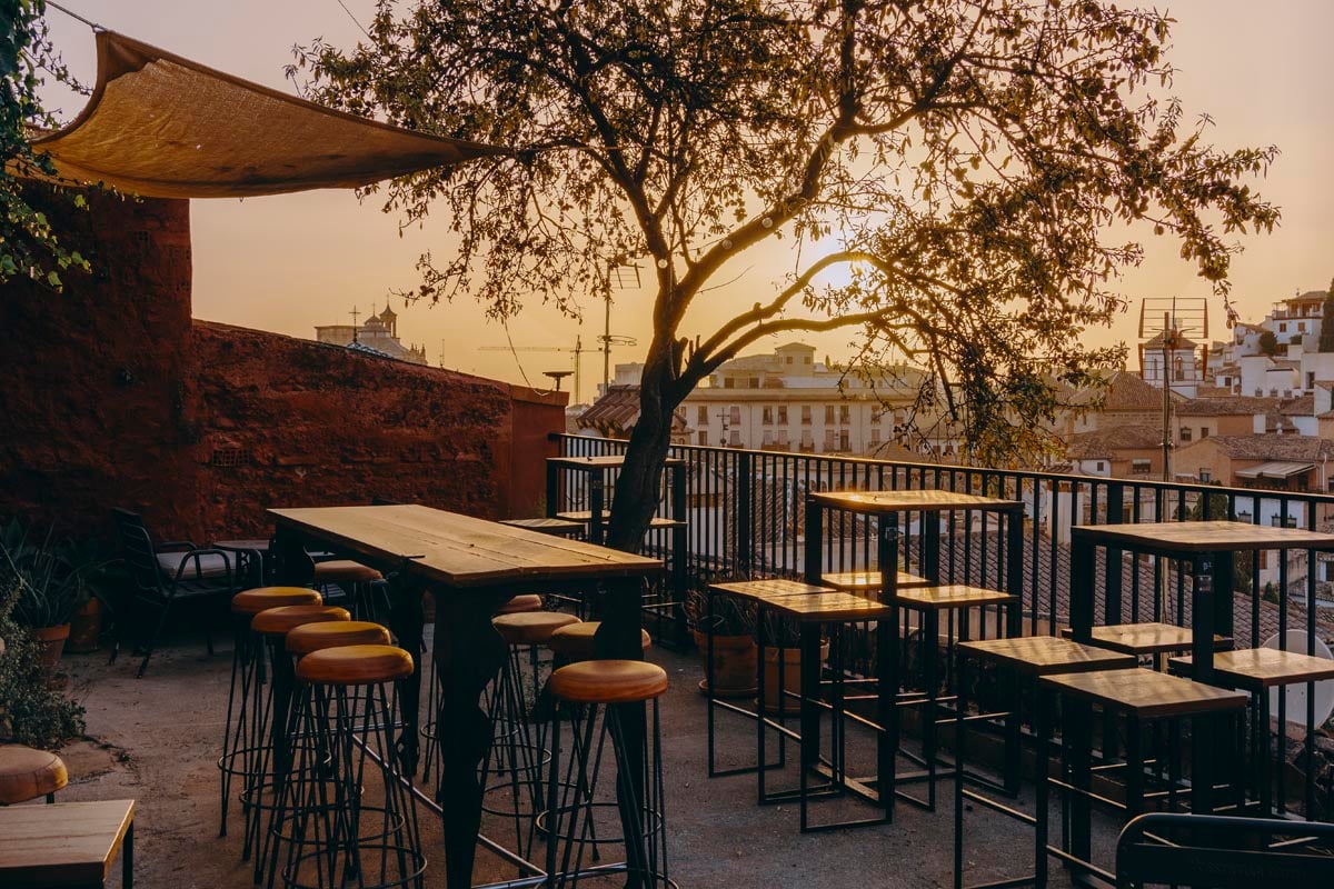 Image of the terrace and the sunset of Huerto del Loro