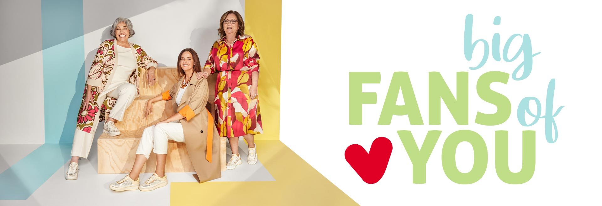 Three women, clients of Pikolinos posing as models with designs from the Pikolinos Spring-
                    Summer collection.