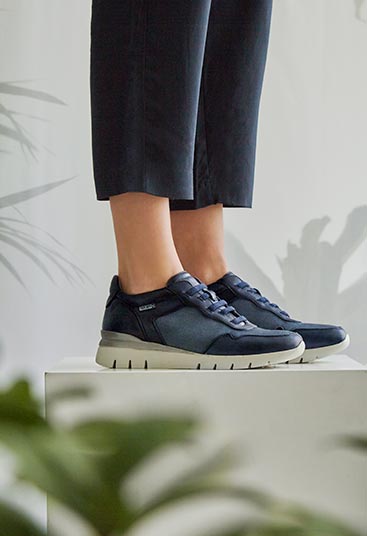 women's sneakers in different textures and light sole